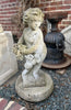 Cast Stone Figure with Grape Detail and Round Stone Base